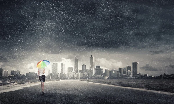 Woman with rainbow umbrella — Stock Photo, Image