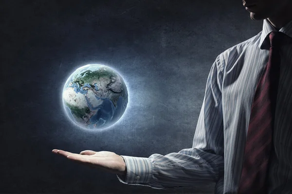 Planet in hands — Stock Photo, Image