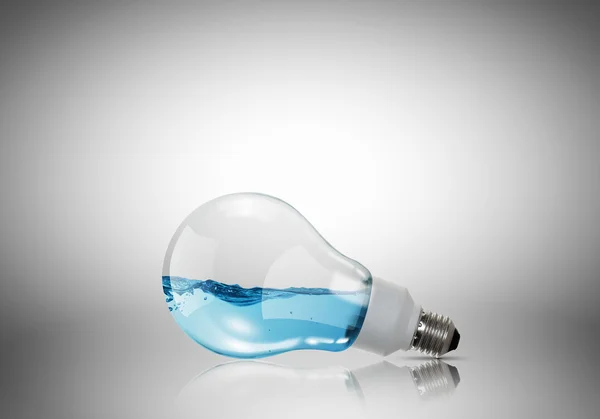 Light bulb with water — Stock Photo, Image