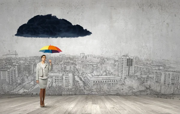 Businesswoman with umbrella — Stock Photo, Image