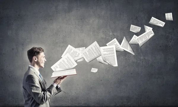 Businessman with book — Stock Photo, Image