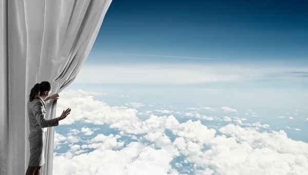 Woman open curtain — Stock Photo, Image