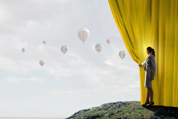 Woman open curtain — Stock Photo, Image