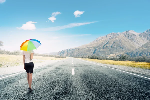 Businesswoman with umbrella — Stock Photo, Image