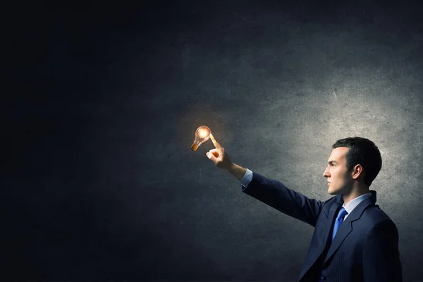 Bulb in hand — Stock Photo, Image