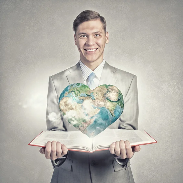 Businessman with book — Stock Photo, Image