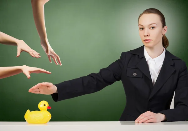 Woman with duck toy — Stock Photo, Image