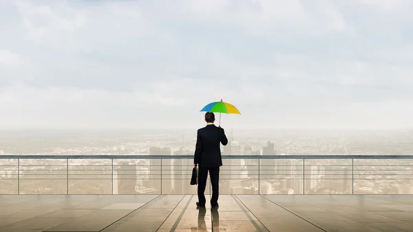 Empresário com guarda-chuva — Fotografia de Stock