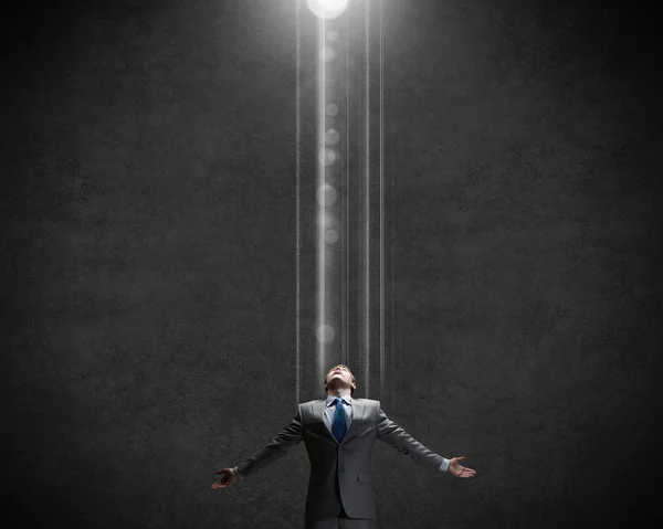 Man standing in light — Stock Photo, Image