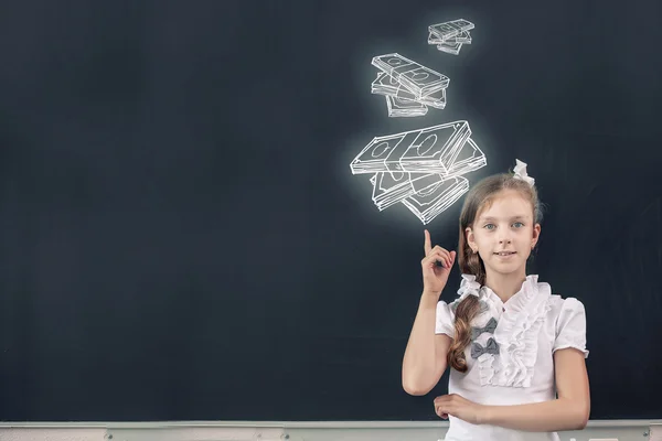 Girl at blackboard — Stock Photo, Image