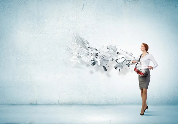 Businesswoman playing drums — Stock Photo, Image