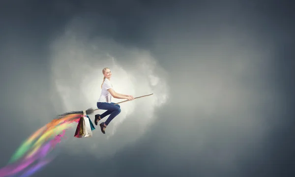 Girl fly on broom — Stock Photo, Image