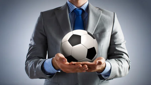 Ball in hands — Stock Photo, Image