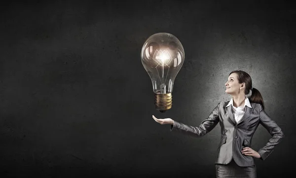 Bulb in hand — Stock Photo, Image