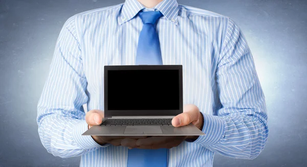 Laptop in hands — Stock Photo, Image