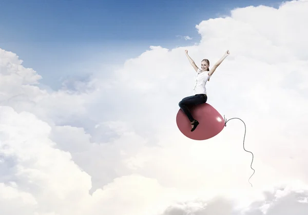 Woman riding balloon — Stock Photo, Image