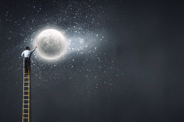 Reaching moon. Concept image