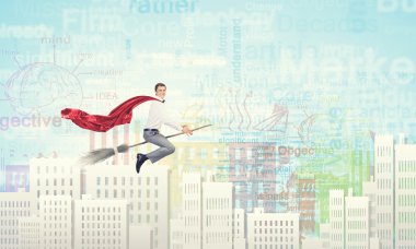 Adam süpürge üzerinde