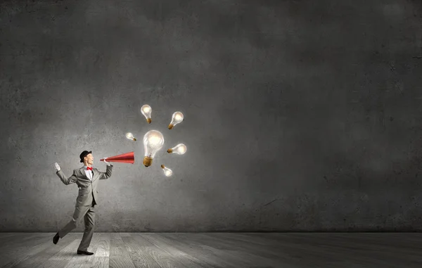 Businessman with trumpet — Stock Photo, Image