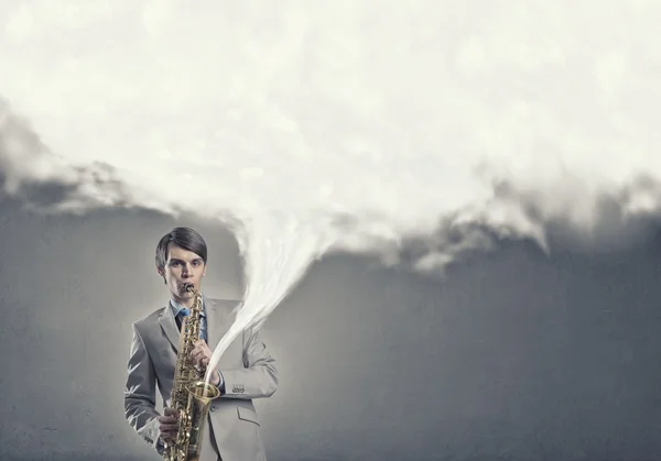 Knappe saxofonist. Concept afbeelding — Stockfoto