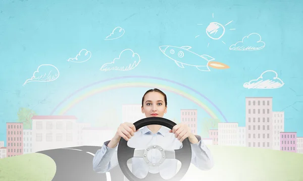 Woman with steering wheel — Stock Photo, Image