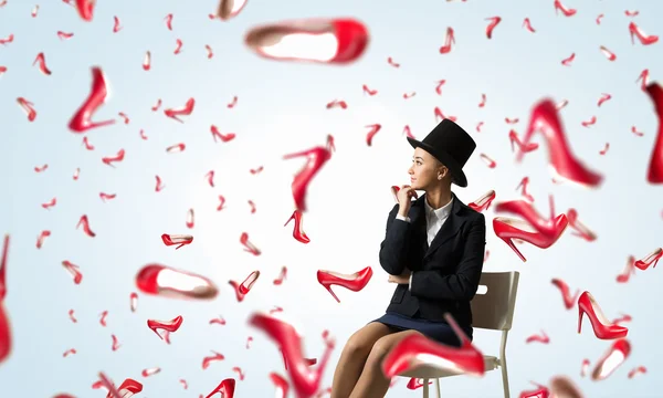 Girl in black cylinder — Stock Photo, Image