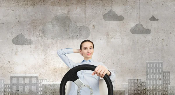 Woman with steering wheel — Stock Photo, Image