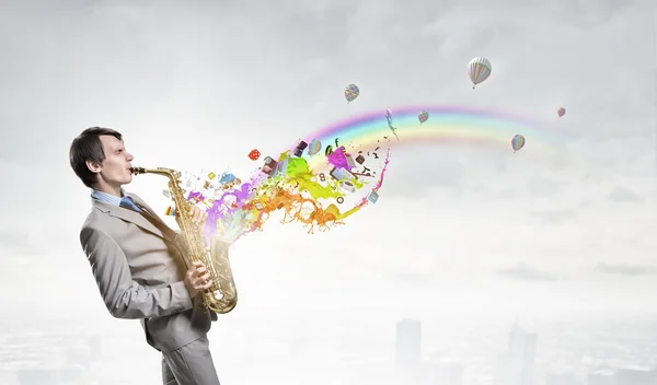 Knappe saxofonist. Concept afbeelding — Stockfoto