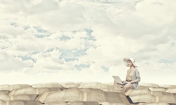 Romantic woman using laptop — Stock Photo, Image