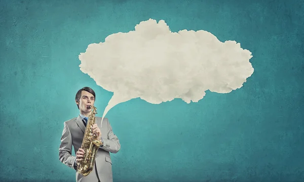 Un apuesto saxofonista. Imagen conceptual — Foto de Stock