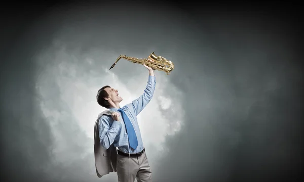 Schöner Saxofonist. Konzeptbild — Stockfoto