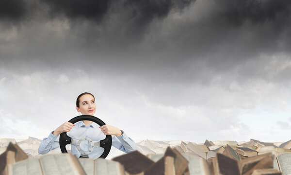 Woman with steering wheel