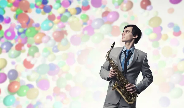 Handsome saxophonist. Concept image — Stock Photo, Image