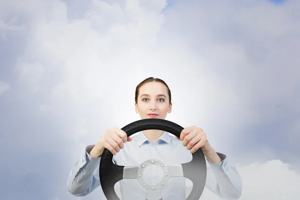 Woman with steering wheel — Stock Photo, Image