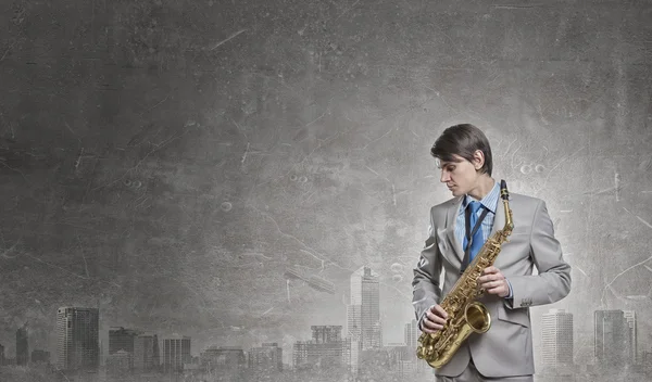 Pohledný saxofonista. Koncepce obrázek — Stock fotografie