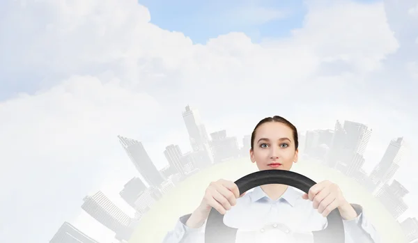 Woman with steering wheel — Stock Photo, Image