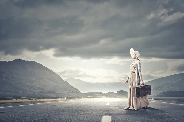 Woman with old suitcase — Stock Photo, Image