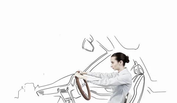 Woman with steering wheel — Stock Photo, Image