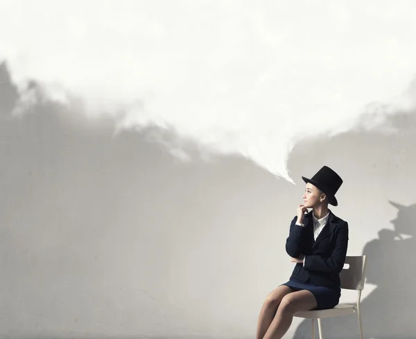 Girl in black cylinder — Stock Photo, Image