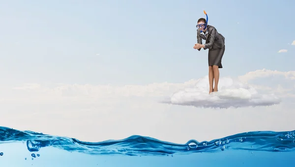 Businesswoman diver on the cloud — Stock Photo, Image