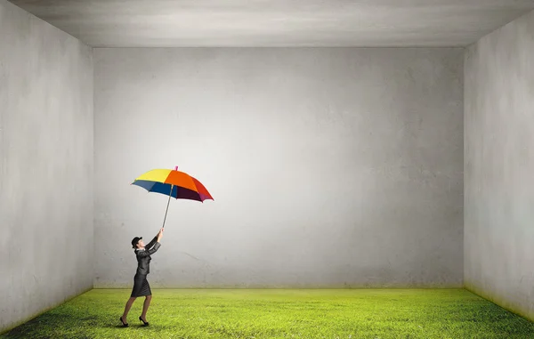 Woman flying on umbrella — Stock Photo, Image