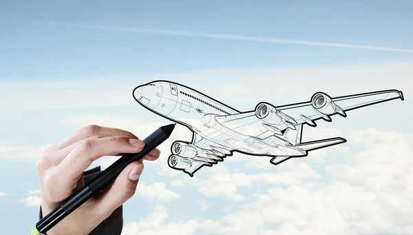 Návrháře kreslit letadlo — Stock fotografie