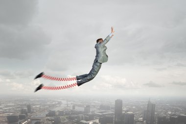 Geniş atlama yapmak iş adamı