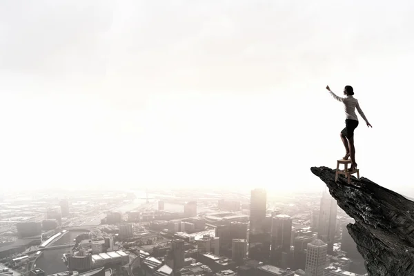 Woman reaching hand up — Stock Photo, Image