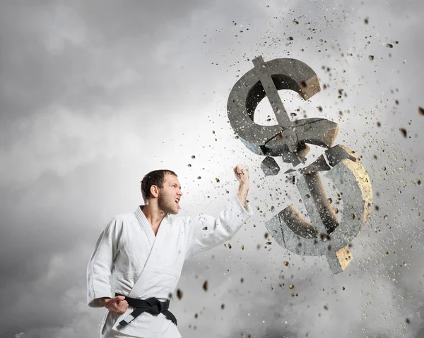 Karate man in white kimino — Stock Photo, Image