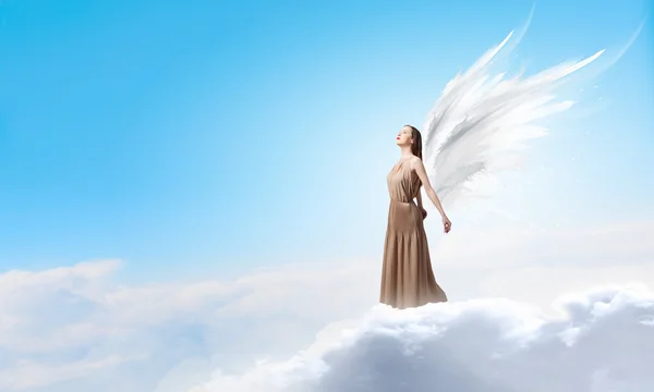 Angel girl flying high — Stock Photo, Image