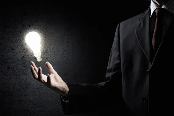 Bright idea in hand — Stock Photo, Image