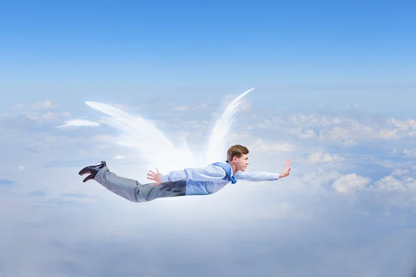 Üzletember angyal szárnyakkal — Stock Fotó