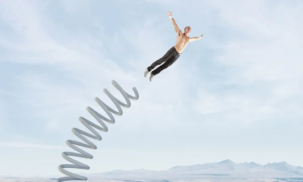 Man jump on springboard — Stock Photo, Image
