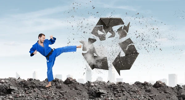 Karate man in blue kimino — Stock Photo, Image